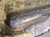 Image 5 of 13 : Once the grate was clear the water level dropped quickly