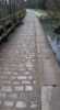Image 6 of 7 : A transition point between our cobbles and our new towpath surface
